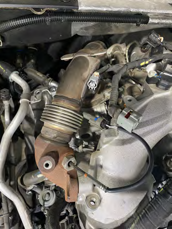 Install the new 3 1/2" down pipe from the top