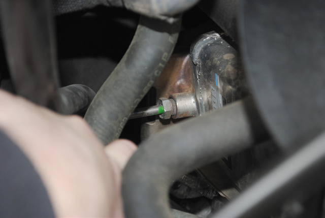 Remove the two temperature sensors from the EGR cooler