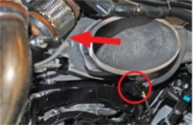 Disconnect the EGR temperature sensor and remove the short EGR pipe