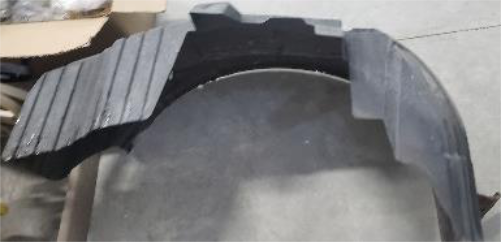 Remove the passenger side fender well