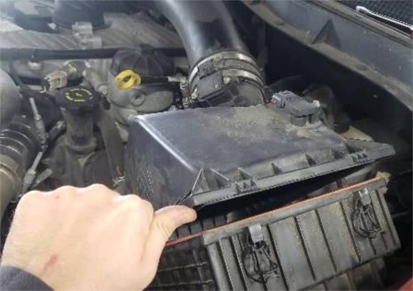 Open the housing and remove the filter