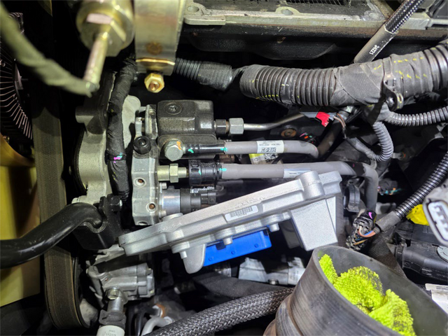 Disconnect the ECM connectors and unbolt the ECM