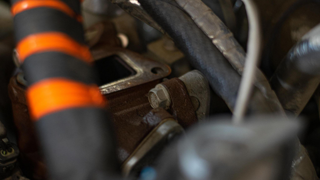 Unbolt the EGR cooler from the motor