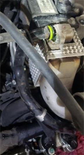 Disconnect the EGR cooler supply and return lines