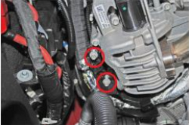Remove the two bolts securing the wiring harness to the EGR cooler