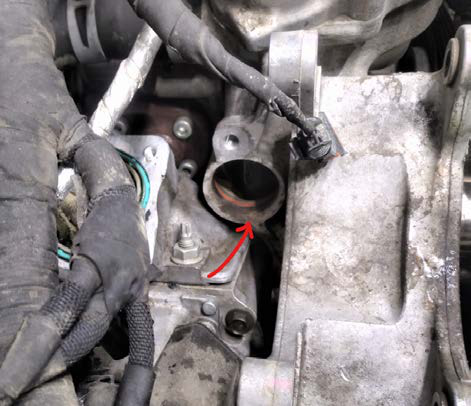 Fit the billet plug into the thermostat housing