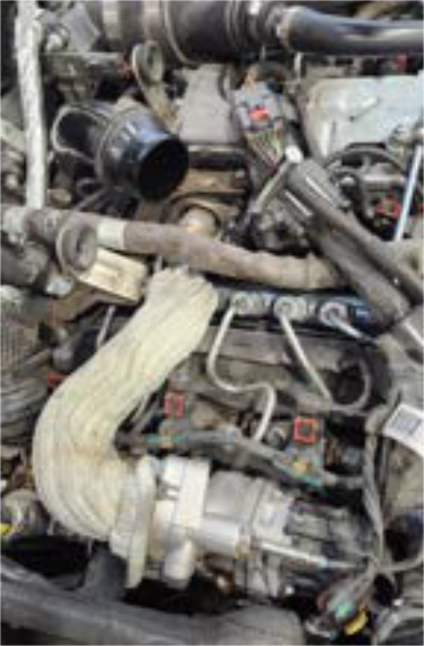 Remove the EGR intake tube and install the red blocker plate